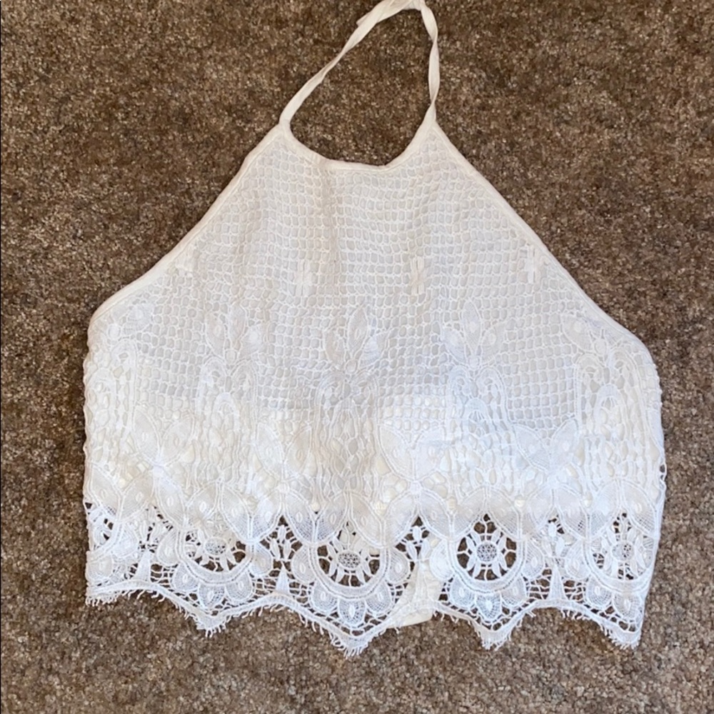 Cream crochet halter crop too.
